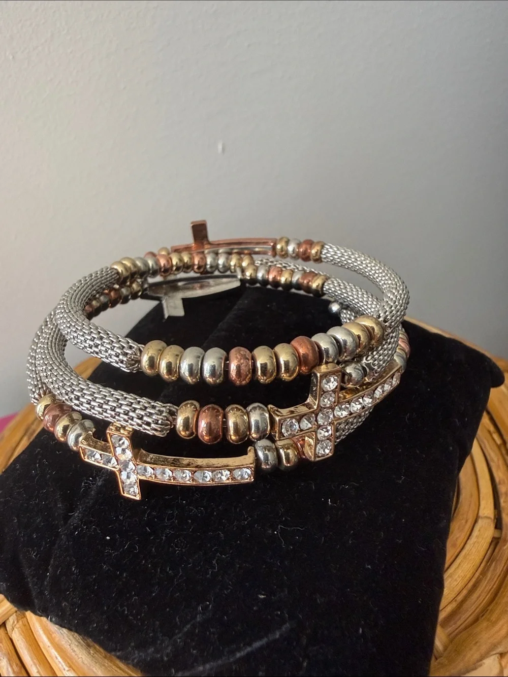 Silver Tone Coil Bracelet with 3 Rhinestone Crosses & Tri Color Beads.